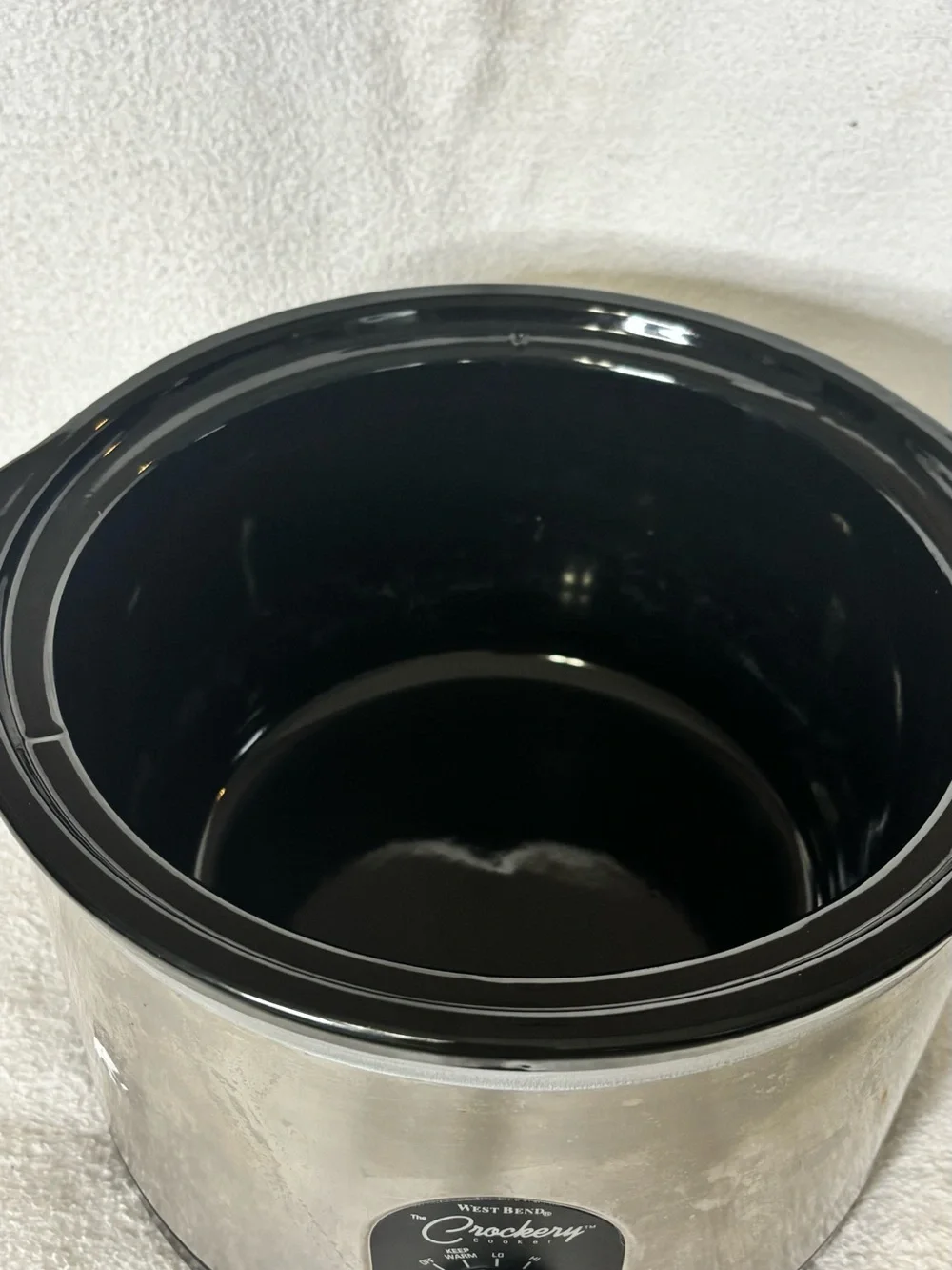West Bend Crockery Stainless Steel Slow Cooker in Black and Silver